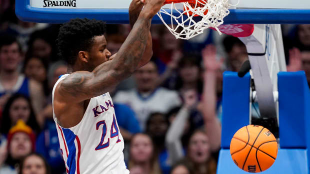Jan 6, 2024; Lawrence, Kansas, USA; Kansas Jayhawks forward K.J. Adams Jr. (24) dunks the ball during the first half against the TCU Horned Frogs at Allen Fieldhouse. Mandatory Credit: Jay Biggerstaff-USA TODAY Sports  